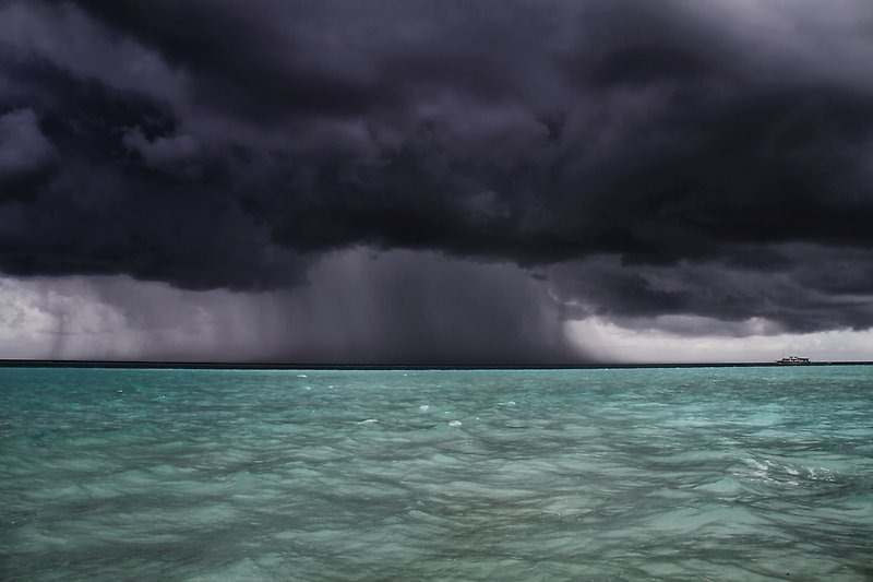 Stormy cloud, heavy rani, a bit upset sea.