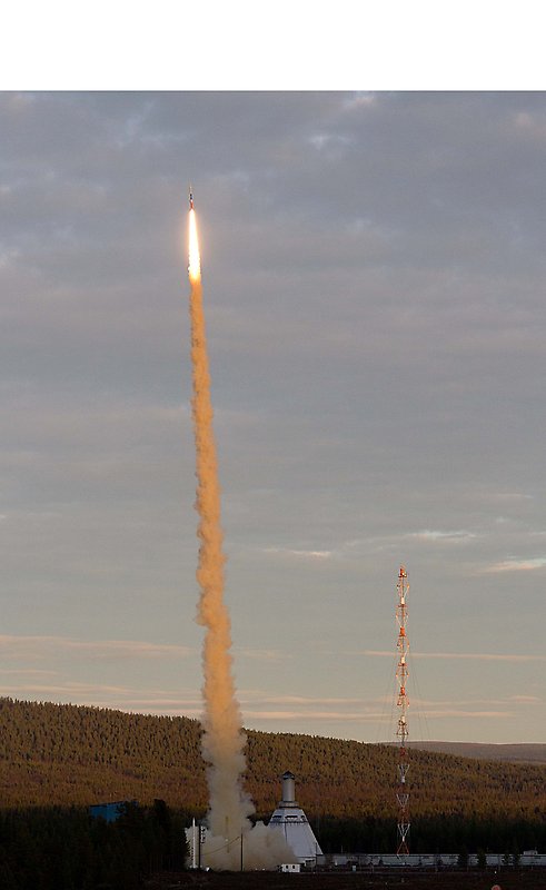 Glowing rocket and oraing smoke.